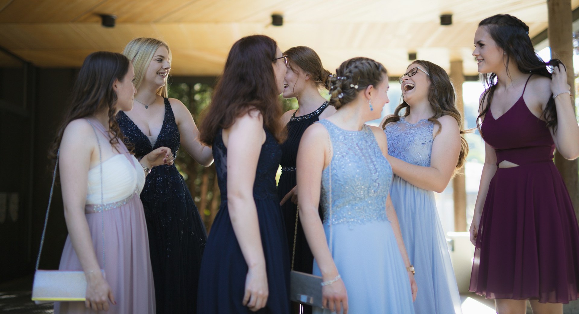 Girls wearing prom dresses